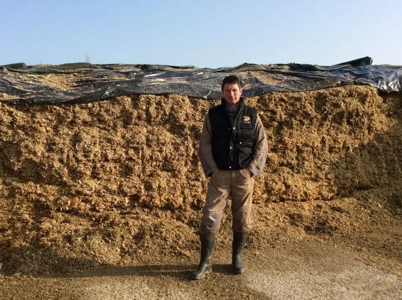 JOSERA customer in front of silage stock